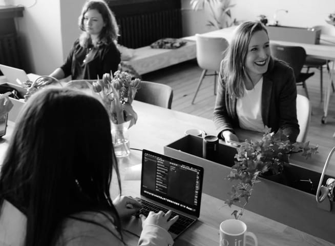 image of a smiling woman in a office